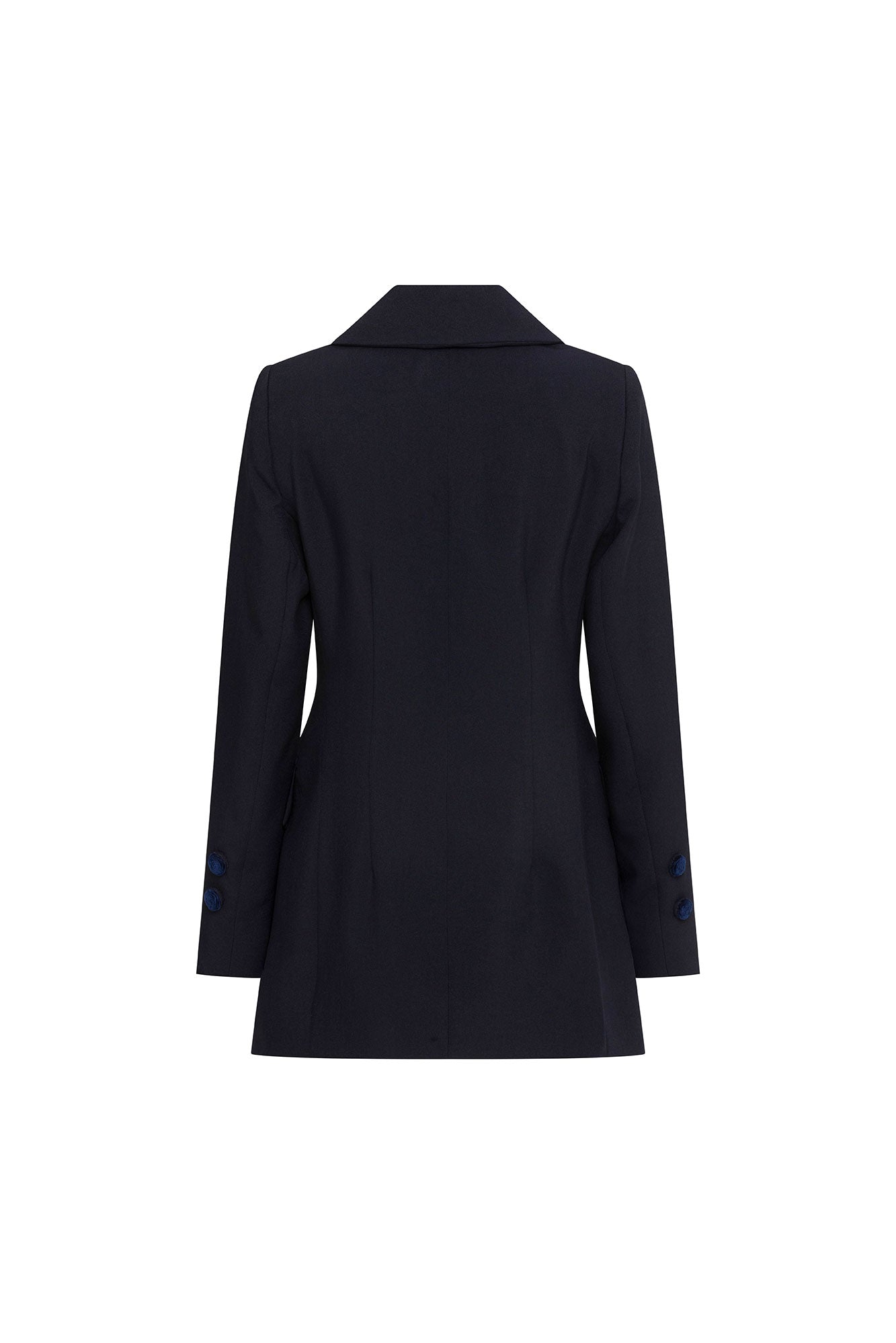 The Blazer Botón Rosa — full back view showing clean structured navy crepe silhouette with two back waist darts, centered back vent, navy velvet trim band at each cuff, and shaped hip flare