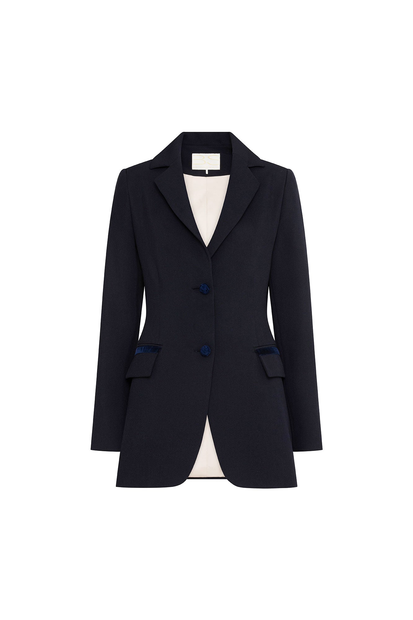 The Blazer Botón Rosa Navy Crepe Blazer — full front view showing wide notched lapel opening to ivory lining, three navy velvet rose-embossed buttons at center front, two hip flap pockets with velvet buttons, and fitted waist silhouette