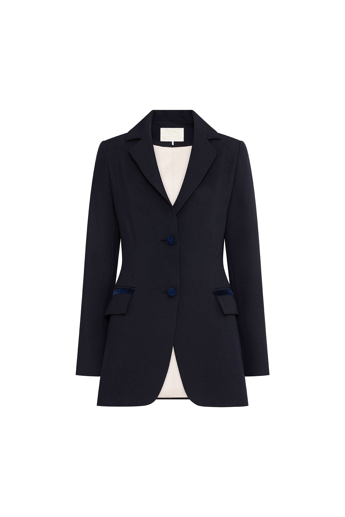 The Blazer Botón Rosa Navy Crepe Blazer — full front view showing wide notched lapel opening to ivory lining, three navy velvet rose-embossed buttons at center front, two hip flap pockets with velvet buttons, and fitted waist silhouette
