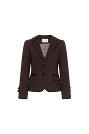 Blazer Juan Cintas Botón Rosa Café — full front view showing fitted single-breasted chocolate brown blazer with three large domed brown buttons, clean notched lapel opening to reveal multicolor Prince of Wales check lining, two hip flap pockets with narrow dark brown velvet ribbon trim