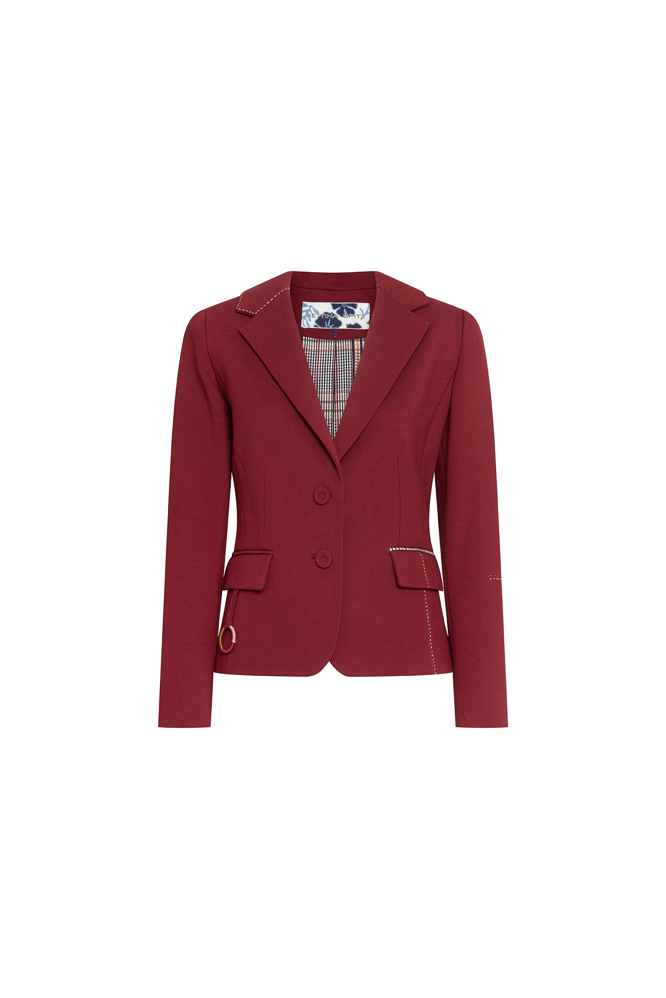 Blazer Juan PP Argollas Vino — full front view showing fitted single-breasted burgundy blazer with two-button closure, notched lapel edged in cream hand topstitch, two hip flap pockets trimmed in Prince of Wales check with topstitch, and gold ring hardware at one pocket corner