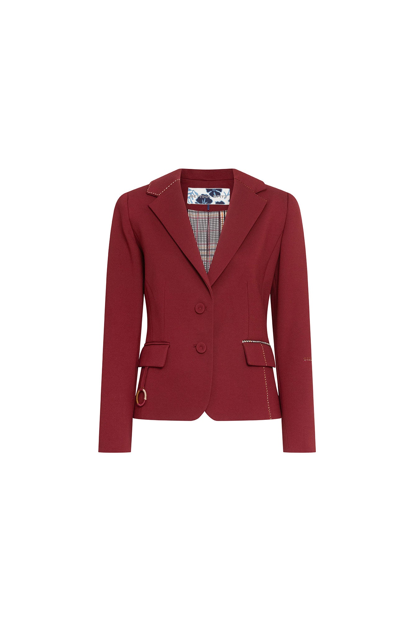 Blazer Juan PP Argollas Vino — full front view showing fitted single-breasted burgundy blazer with two-button closure, notched lapel edged in cream hand topstitch, two hip flap pockets trimmed in Prince of Wales check with topstitch, and gold ring hardware at one pocket corner