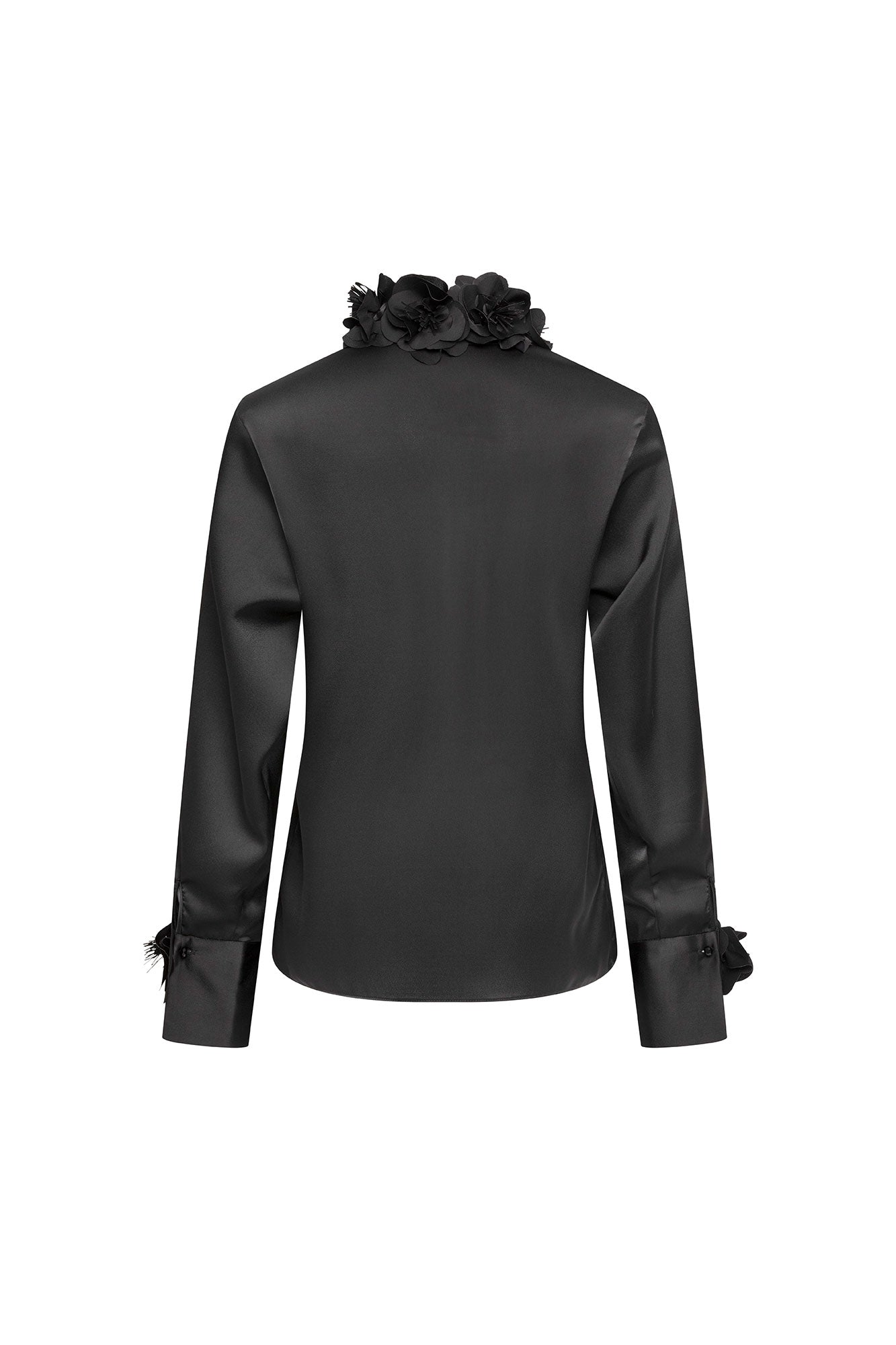 The Verónica Black Satin Blouse — back view with luminous satin fabric, 3D rose collar and rose cuff details