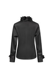 The Verónica Black Satin Blouse — back view with luminous satin fabric, 3D rose collar and rose cuff details