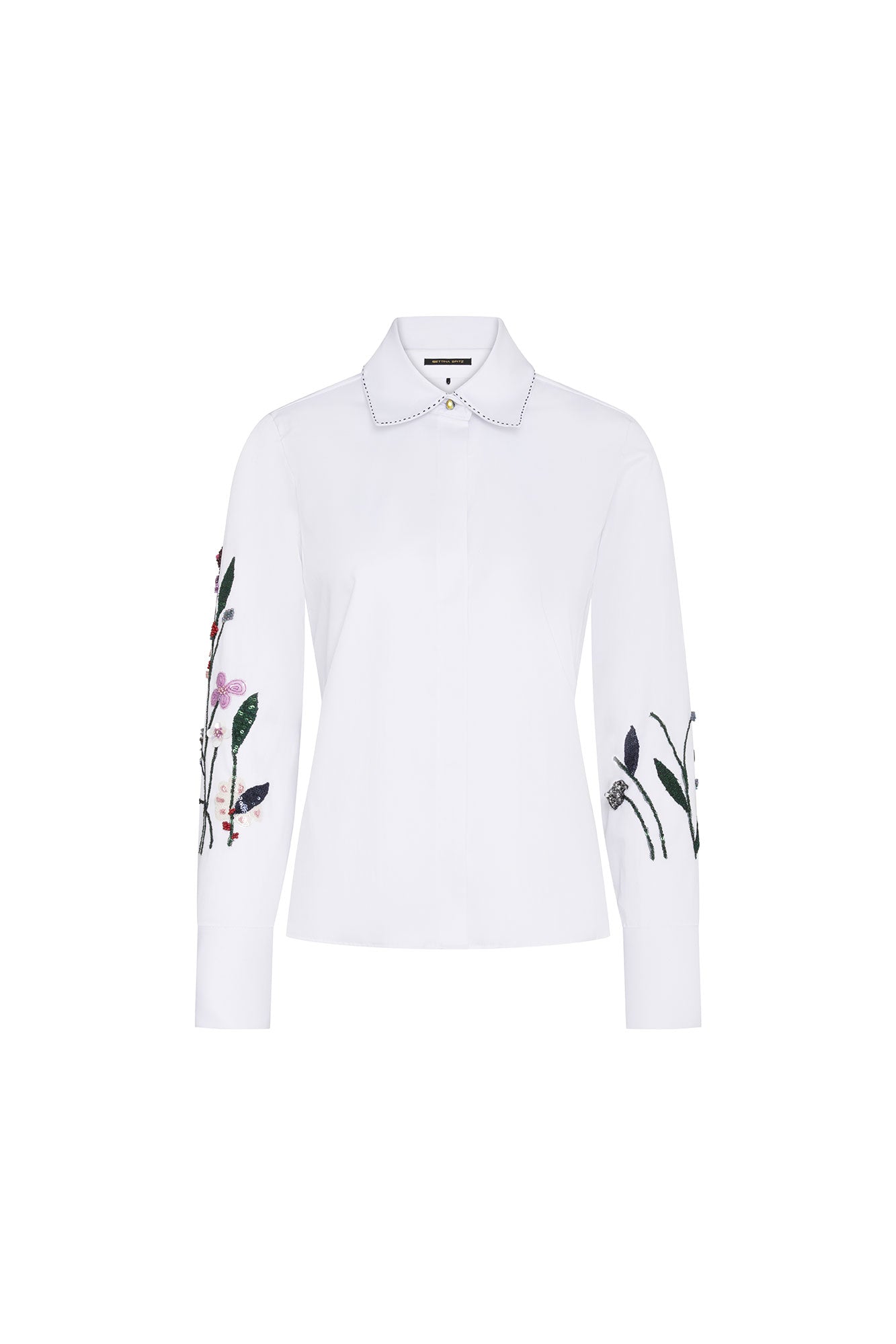 The Sol Flor White Shirt — full front view with Peter Pan collar and hand-embroidered wildflower botanical sleeves