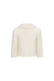 Back view of short ivory jacket with plain back, broad collar and three-quarter sleeves