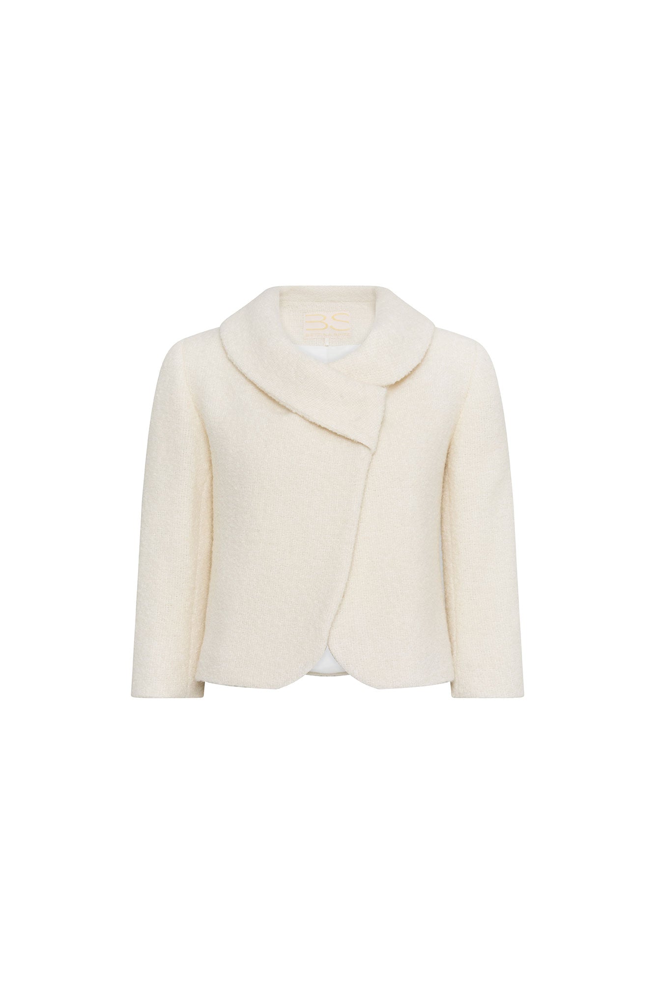 Front view of Bettina Spitz ivory jacket with broad asymmetric collar, overlapping front and rounded edges