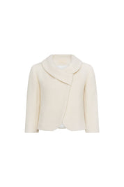 Front view of Bettina Spitz ivory jacket with broad asymmetric collar, overlapping front and rounded edges