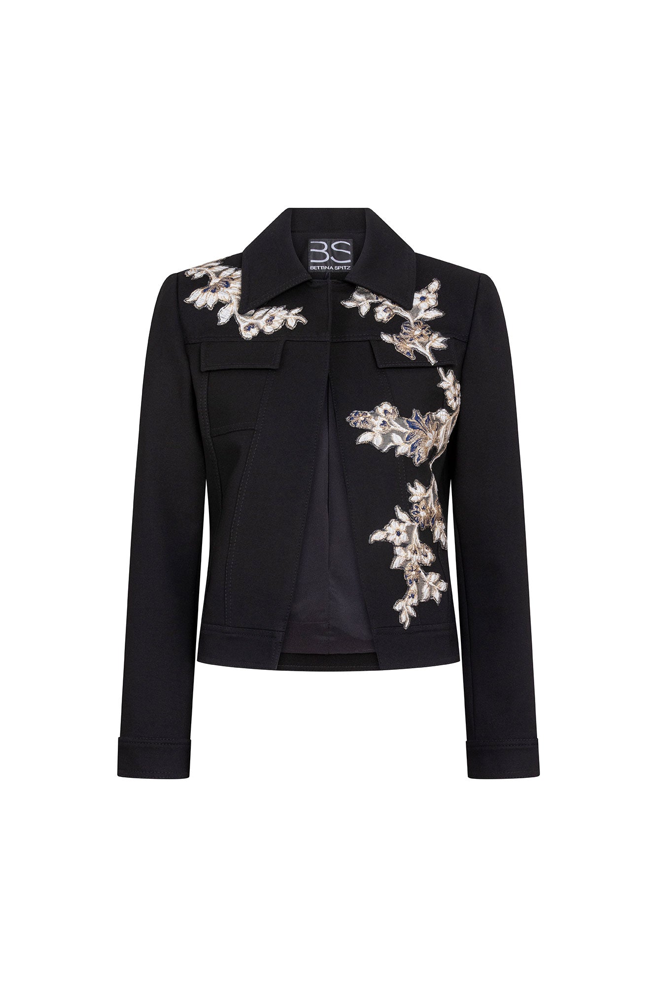 The Chaqueta Barroco Black Jacket — full front view with cropped silhouette and hand-embroidered baroque silver and gold floral vine sweeping from left shoulder across chest pockets to right hip