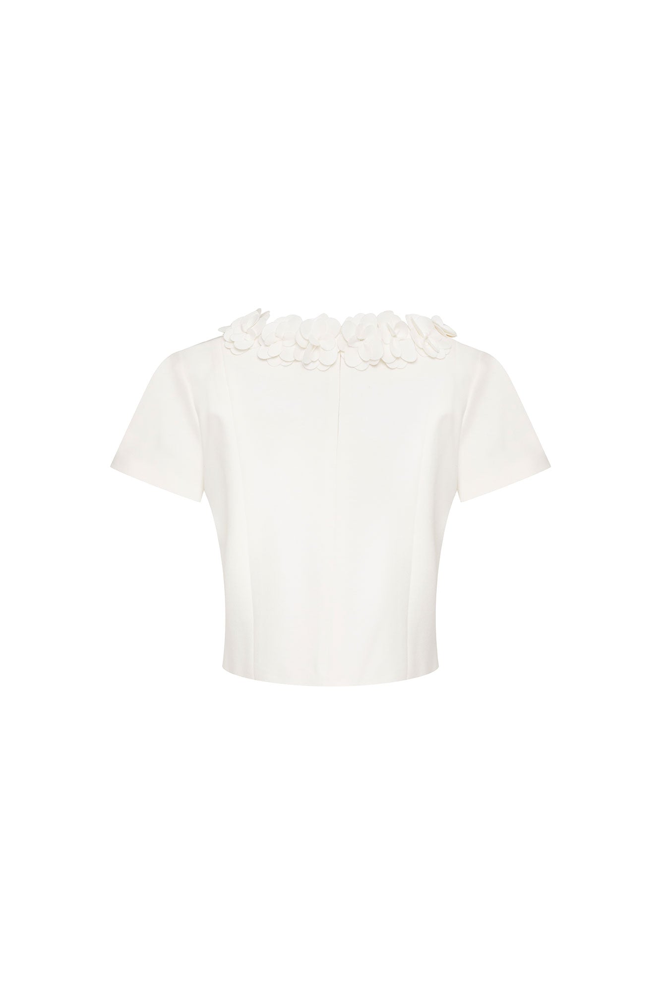 Crop Manguita CR Flor Ivory — full back view showing fitted ivory cropped short-sleeve top with plain ivory stretch fabric body and hand-applied 3D flower collar visible at neckline edge across shoulders