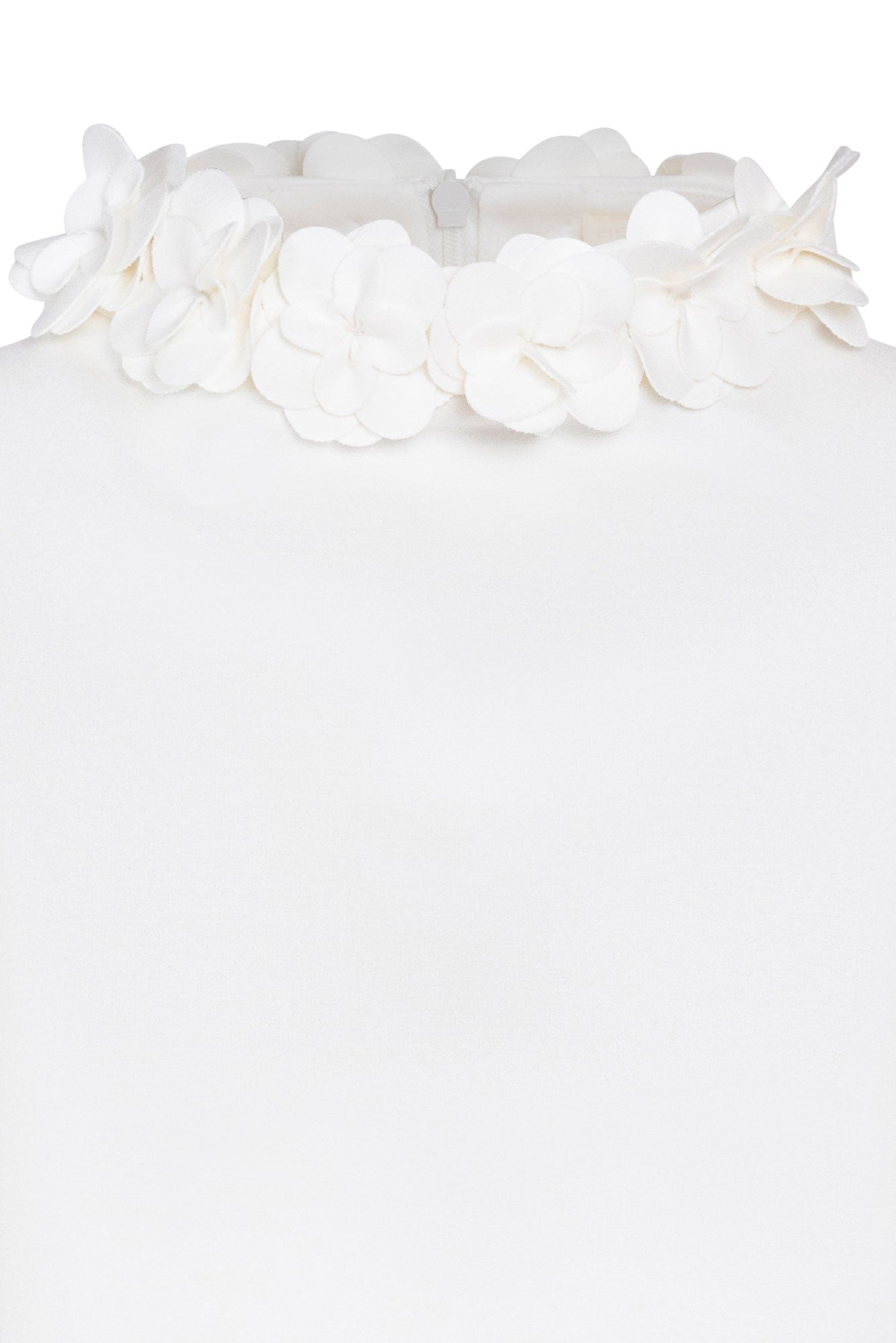 The Flor Crop — close-up of hand-crafted 3D ivory fabric flower wreath neckline showing individually cut and layered hydrangea-like blooms