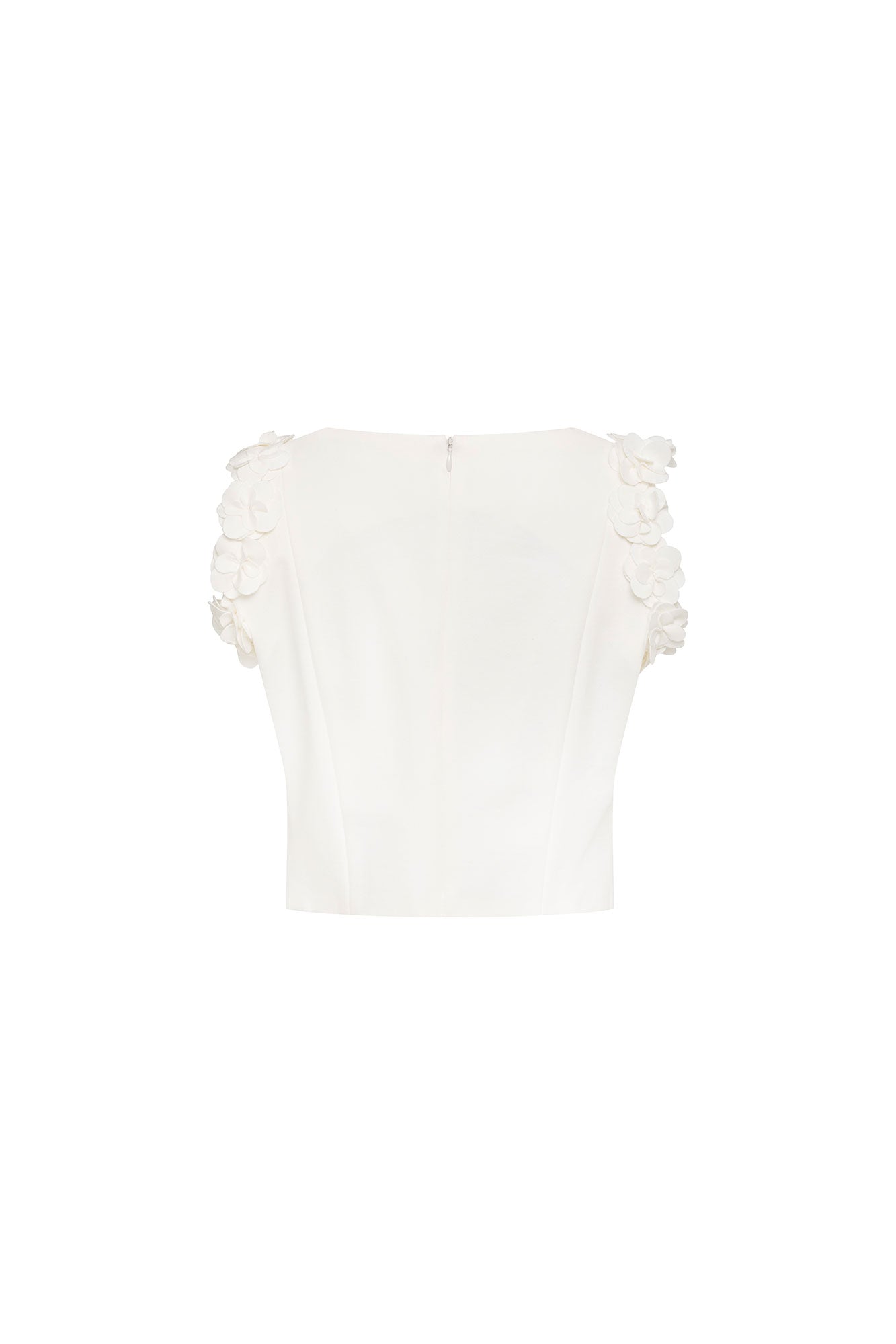 Crop Sisa Flores Ivory — full back view showing fitted ivory cropped sleeveless top with center back keyhole closure, wide bateau neckline at back, and 3D fabric flower columns running along both armhole edges