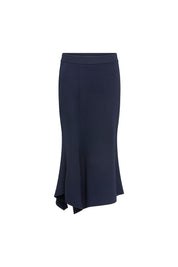 The Falda Línea Navy Asymmetric Fishtail Midi Skirt — front view showing fitted silhouette and dramatic asymmetric fishtail hem