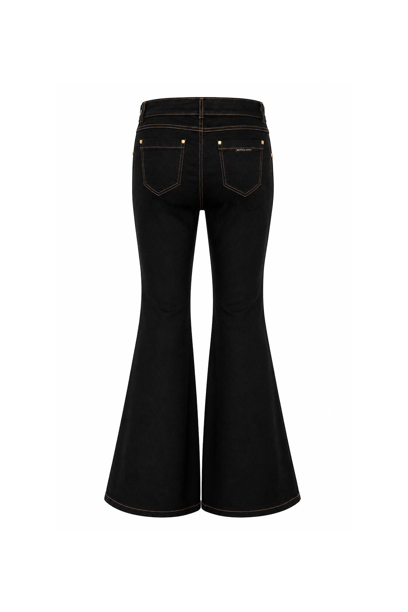 Black bell-bottom jeans with gold dog charm - back view