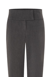 The Haches Charcoal Grey Bootcut Trousers — close-up of wide double-panel waistband and textured woven fabric detail
