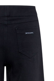 The Nadadora Black Wide-Leg Graphic Pants — back view