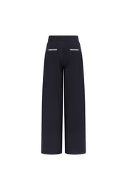 Back view of navy Milo wide-leg trousers with check-trimmed welt pockets