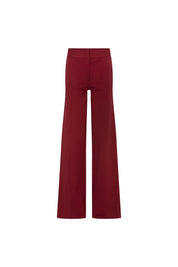 Front view of Bettina Spitz burgundy high-waisted trousers with a clean waistband and wide flared legs