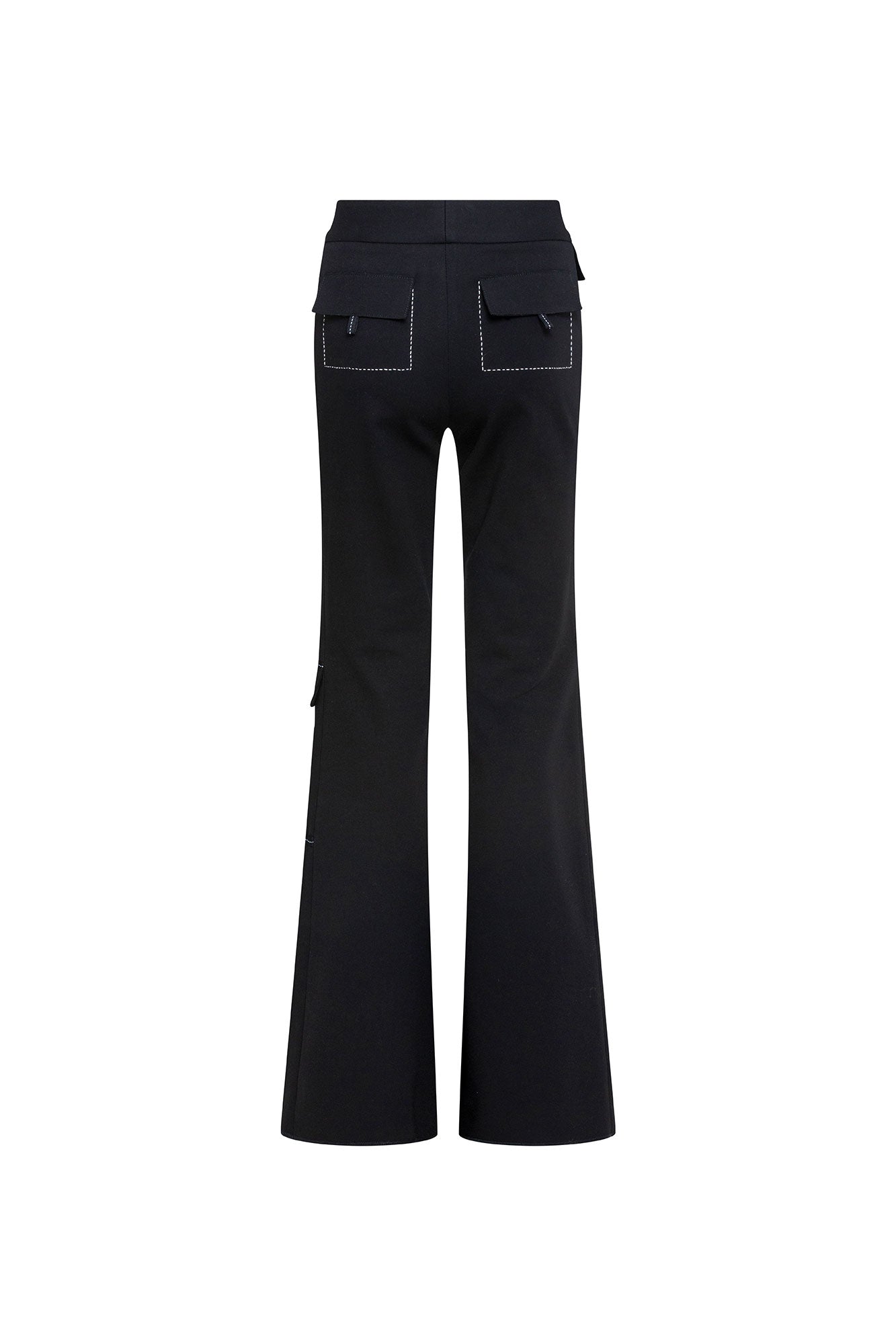 The Patch Campana — full back view showing two large mid-thigh cargo patch pockets with fold-over flaps and white contrast topstitching, and clean flare silhouette from knee to floor