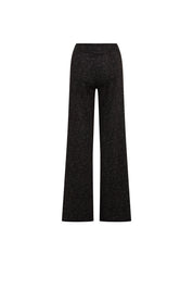 Back view of chocolate leopard-pattern trousers showing clean waist and wide straight legs