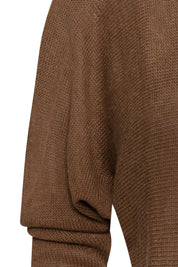Saco Manga Ranglán Chocolate — close-up of dolman-raglan sleeve showing chocolate brown fine knit with subtle lurex thread, sleeve volume draping and pooling naturally at forearm before ribbed cuff gathers the fabric at the wrist