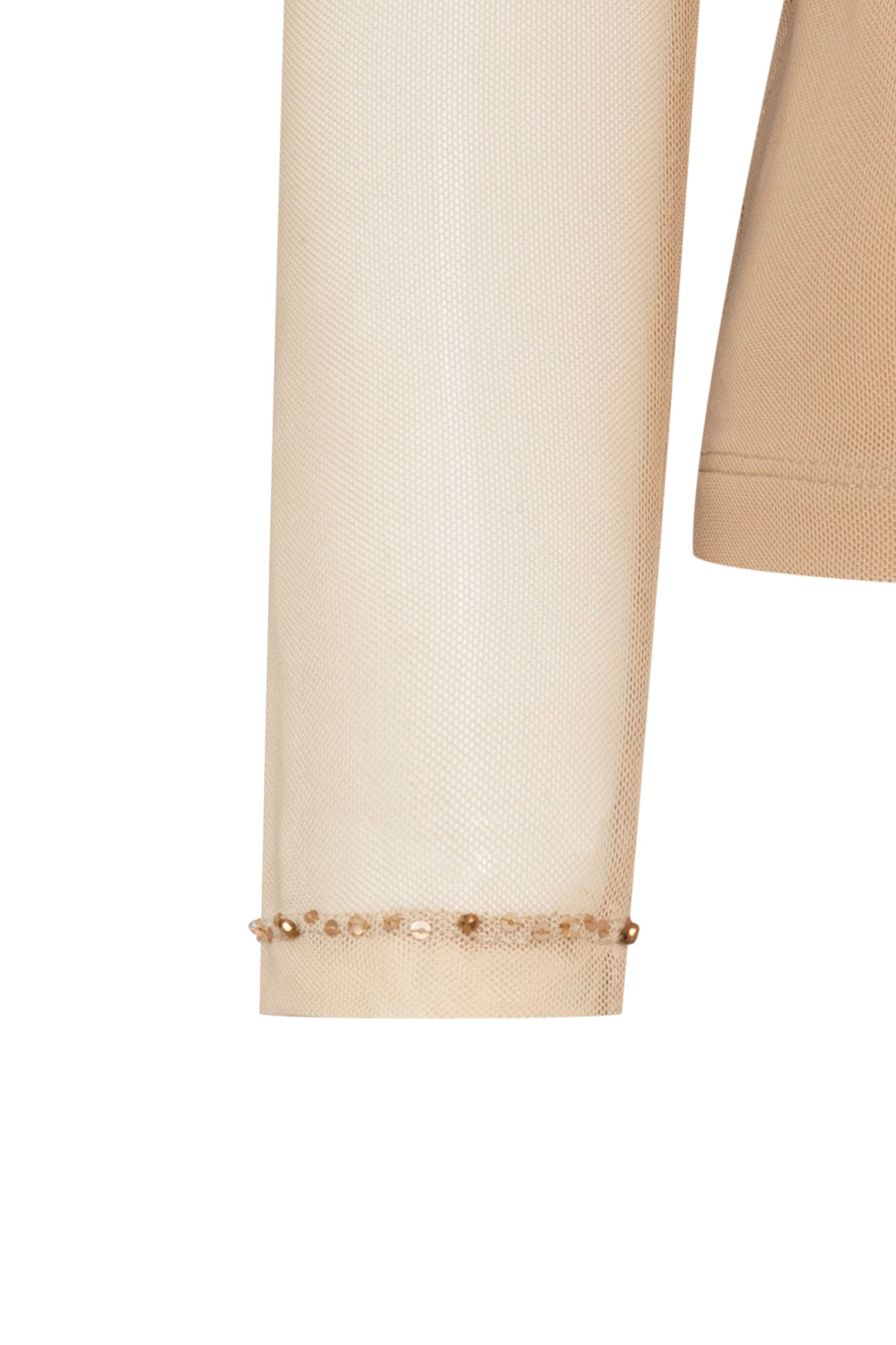 The Top Mallita Cuello Brillos Arena — close-up of sheer ivory mesh sleeve hem showing single row of mixed gold and champagne faceted crystal studs finishing the cuff at the wrist, matching the neckline crystal trim