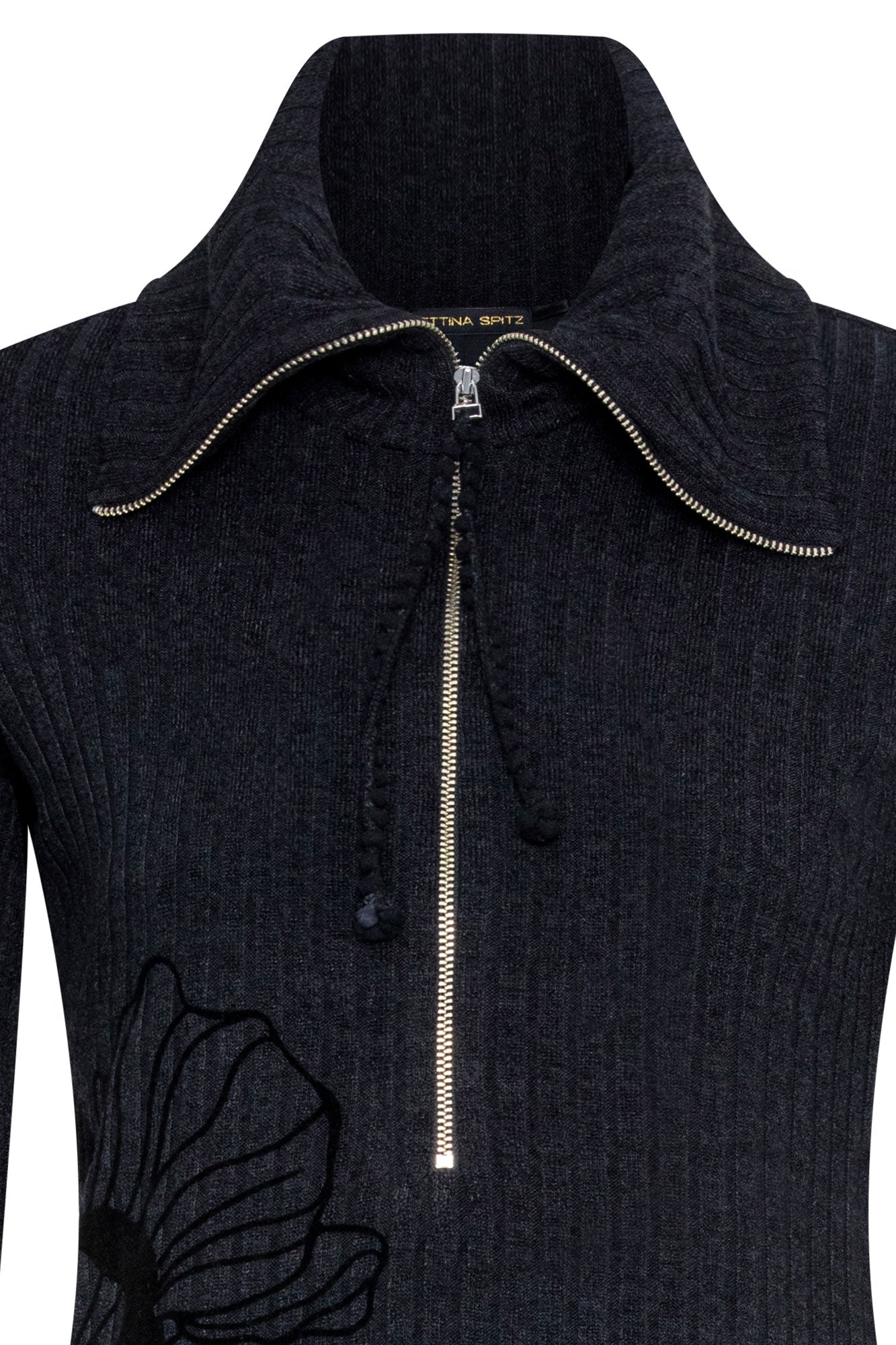 The Flor Black Ribbed Midi Dress — close-up of silver zipper, collar and Bettina Spitz label