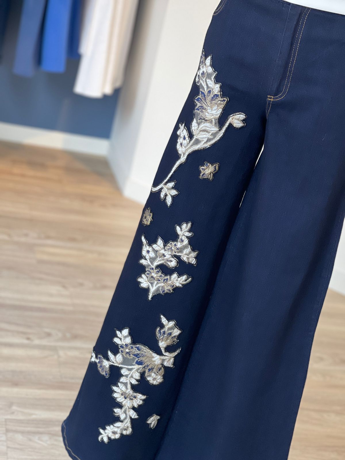 The Jean Barroco — close-up of hand-embroidered baroque floral vine in silver and gold metallic thread with raised satin stitch tulips, bell flowers and scrolling leaves